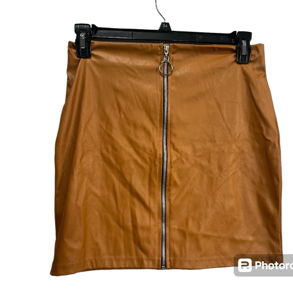 Poof New York Faux leather Skirt.  Size large Tan
